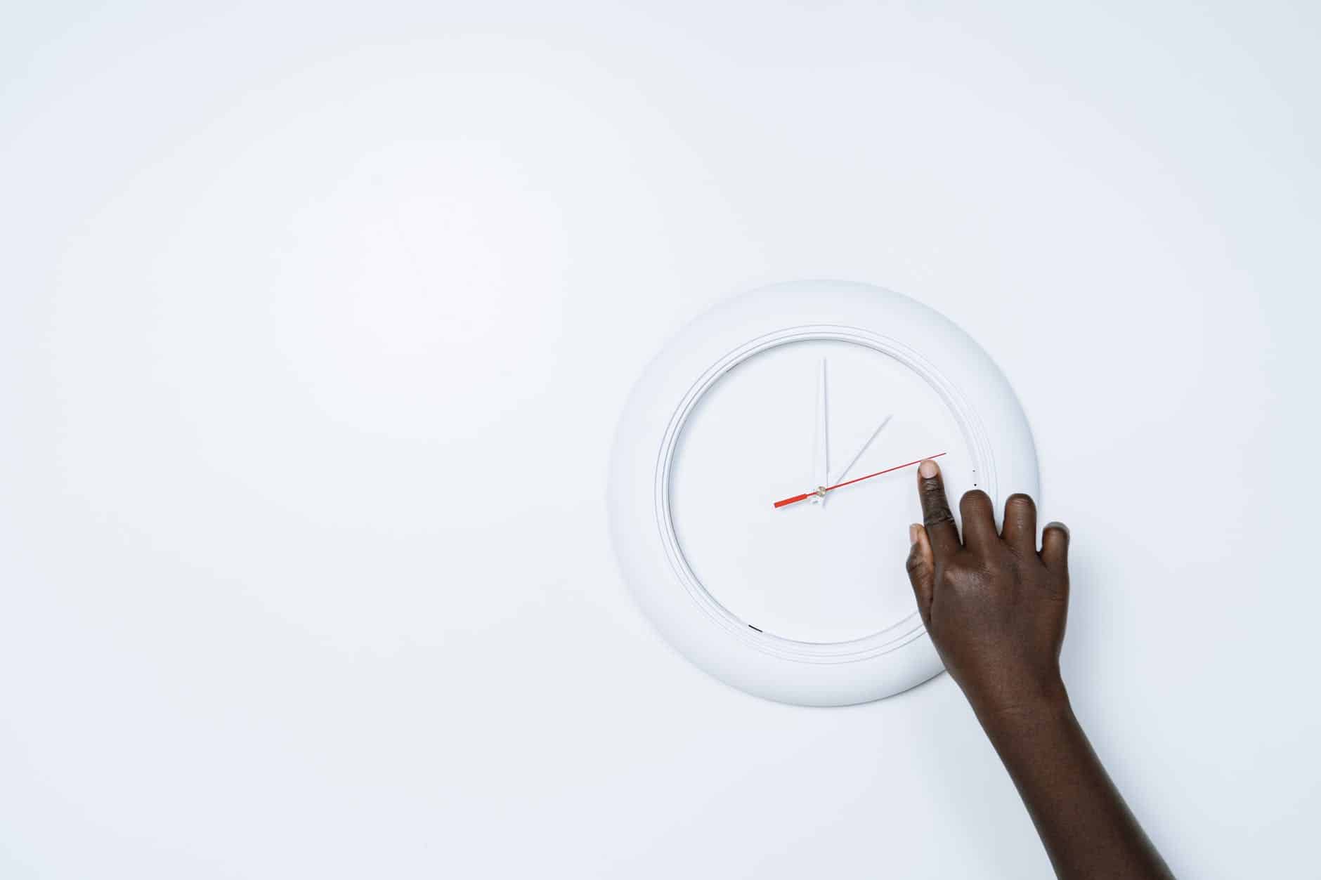 pointing on a arm of a clock